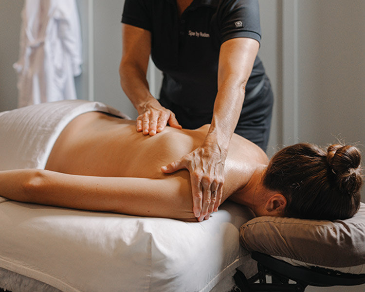 A guest getting a back massage. 