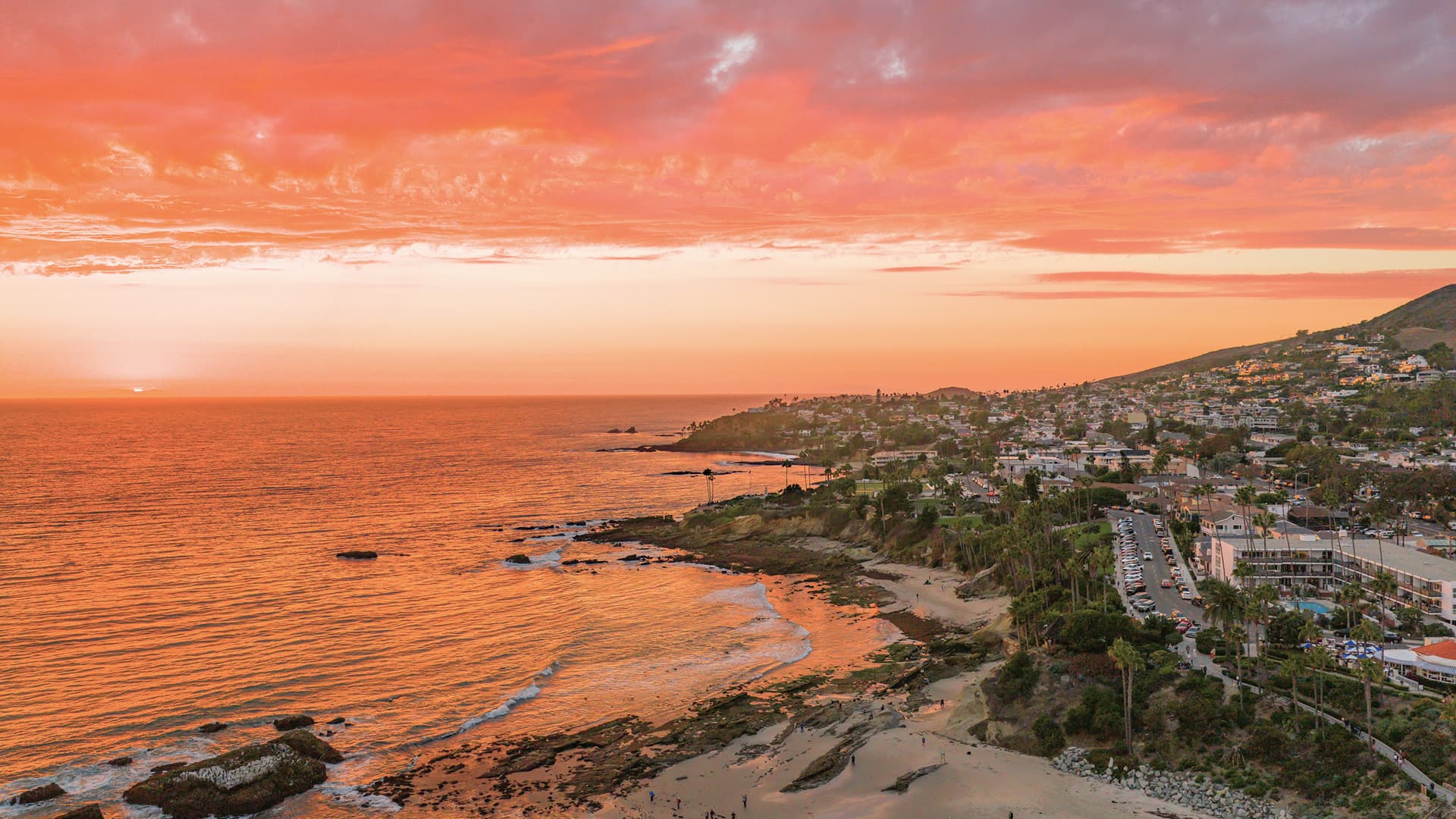 A view of the property duing sunset
